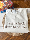 I put my book down to be here